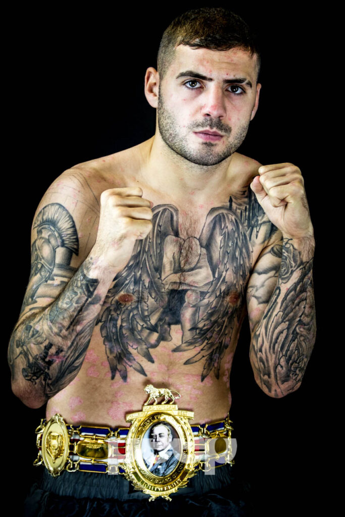 boxing photography by peep. Lewis Ritson holding Lonsdale belt